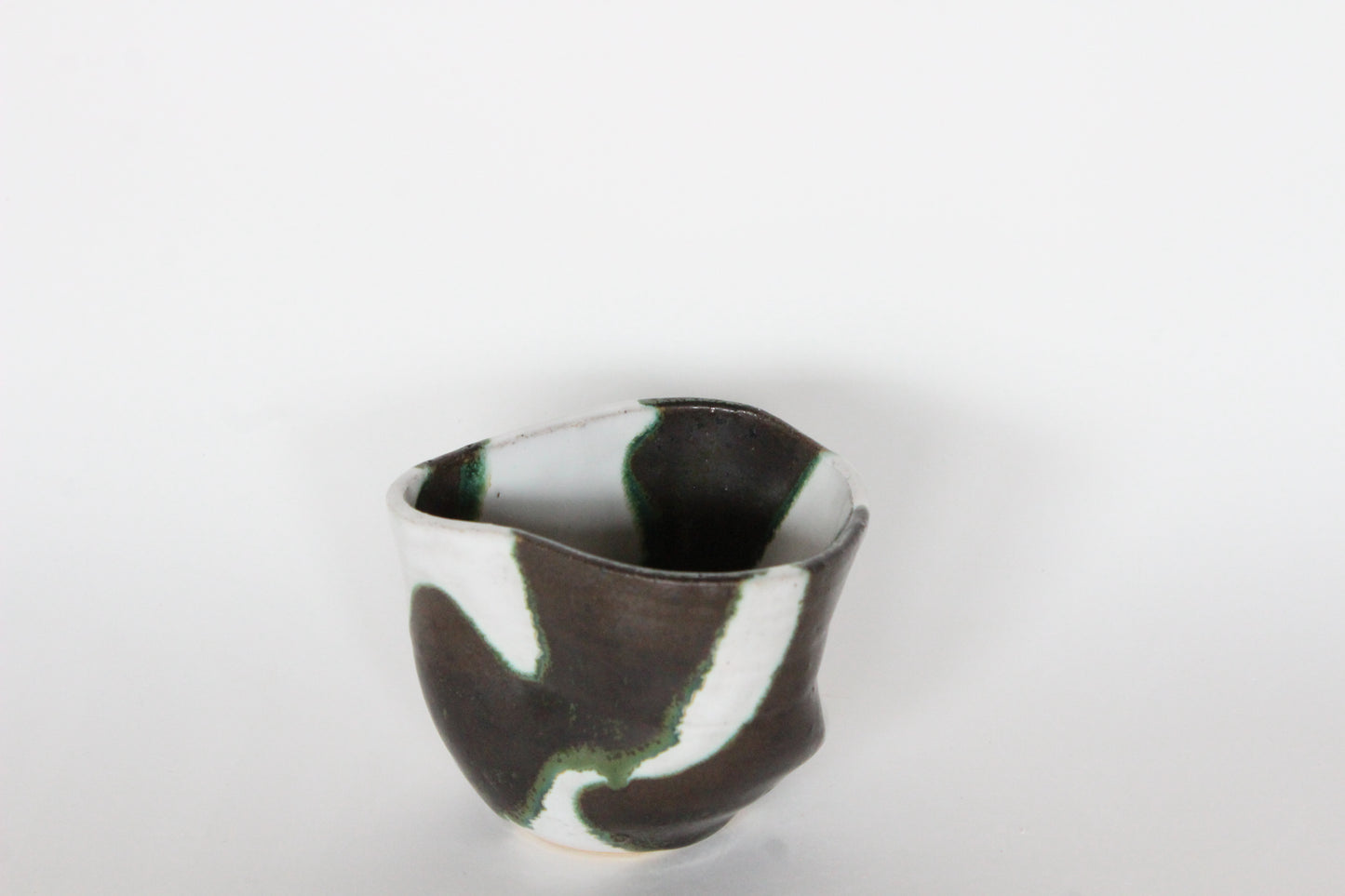 green and white cup