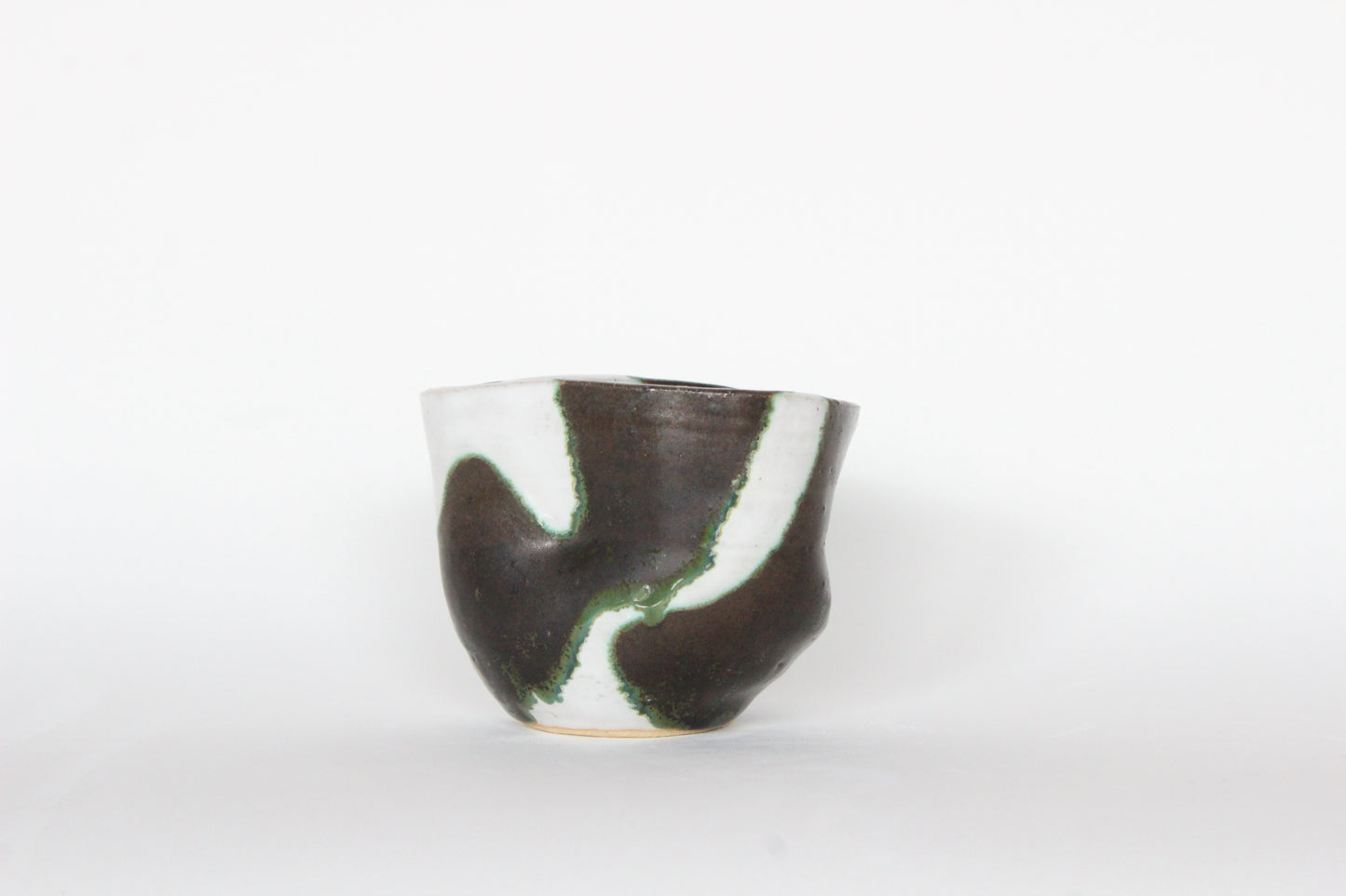green and white cup