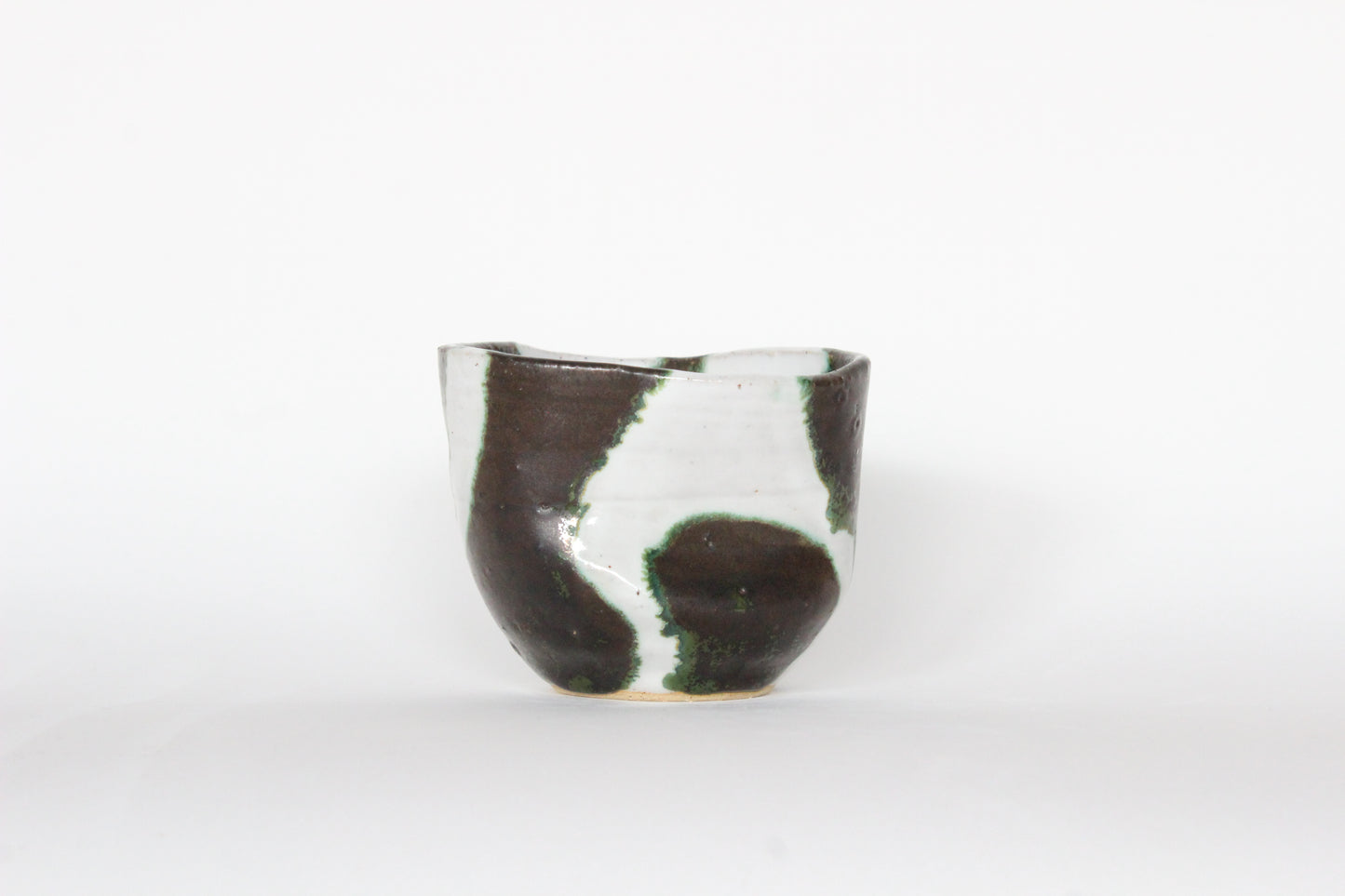 green and white cup