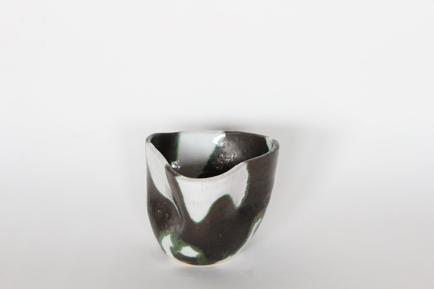 green and white cup